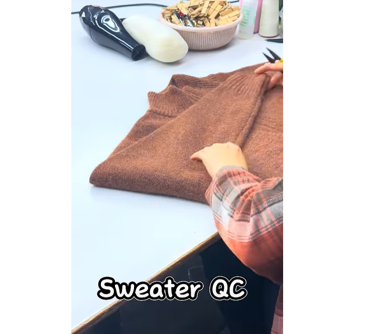 On-Site QC: Professional Sweater Quality Inspection in Our Factory.