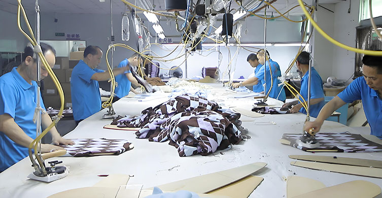Final garment steaming and quality finishing at our factory
