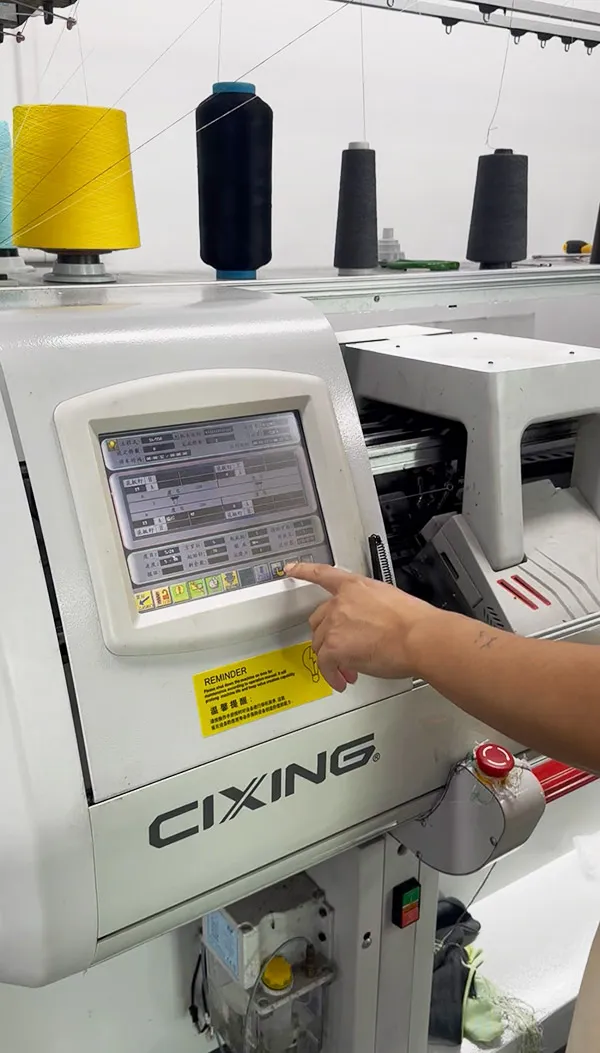 oem knitwear sample room showing pattern making and programming