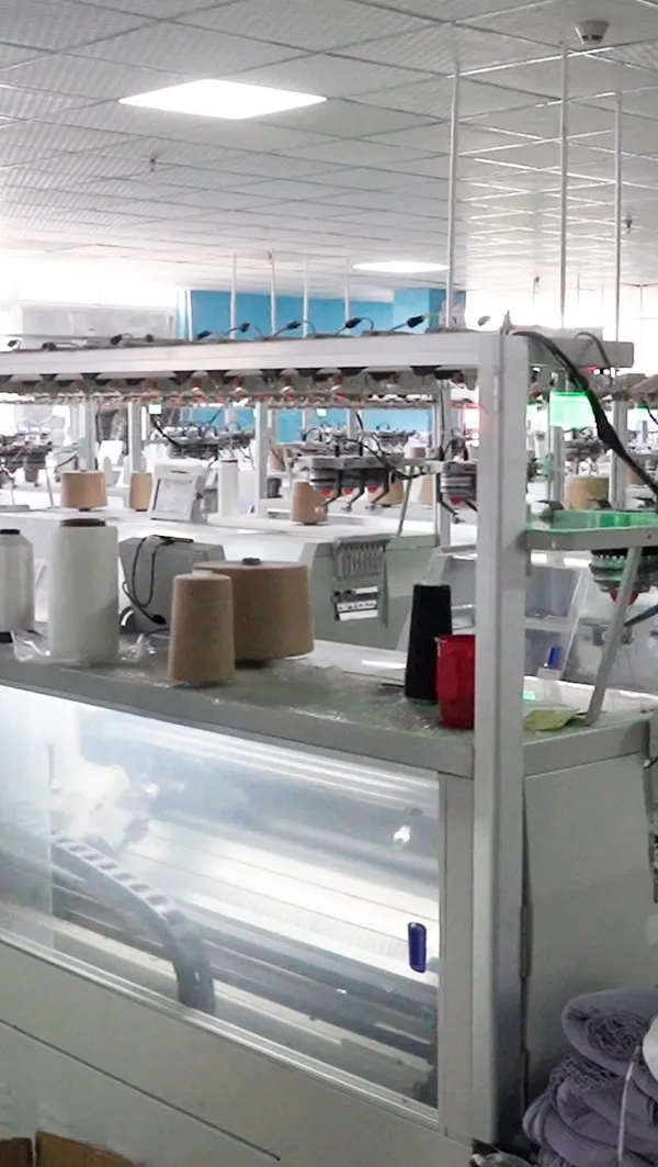oem sweater factory tour showing stoll machines and quality control