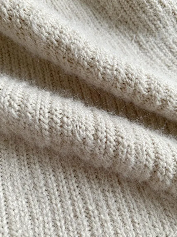 Fluffy mohair boucle sweater fabric texture with cloud-like halo effect