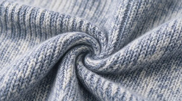 3D structured rib stitch pattern for air trapping thermal insulation