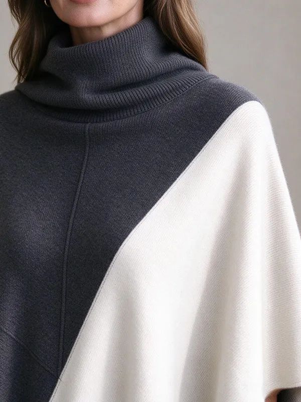 Custom women's knitted swancho hybrid sweater showing a clean turtleneck collar and seamless shoulder slope