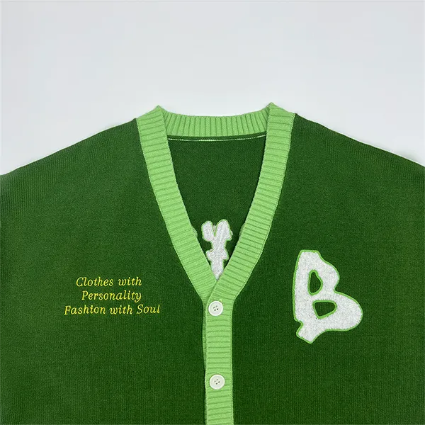relaxed v-neck knit jacket with embroidered patches knitting details